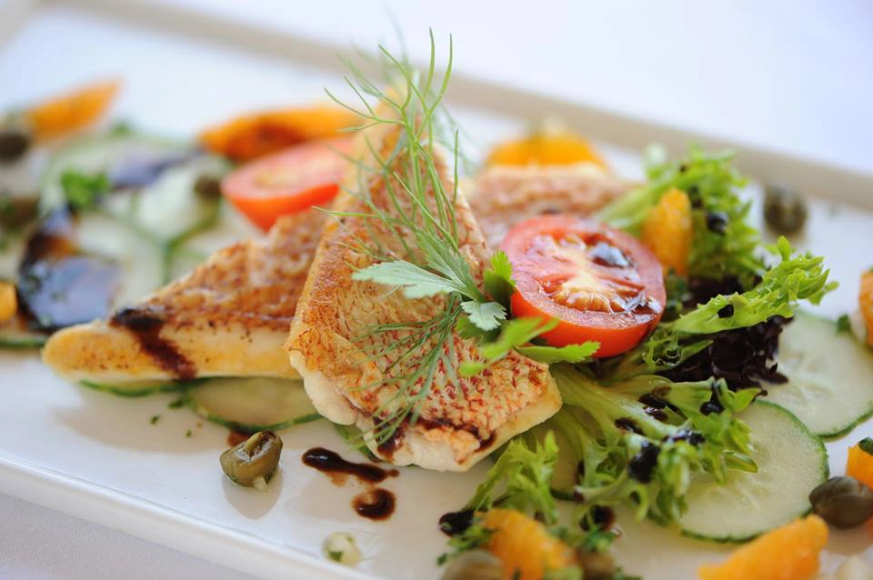 Celebrate with Cayman Islands Cuisine at Our Waterfront Restaurant in Grand Cayman